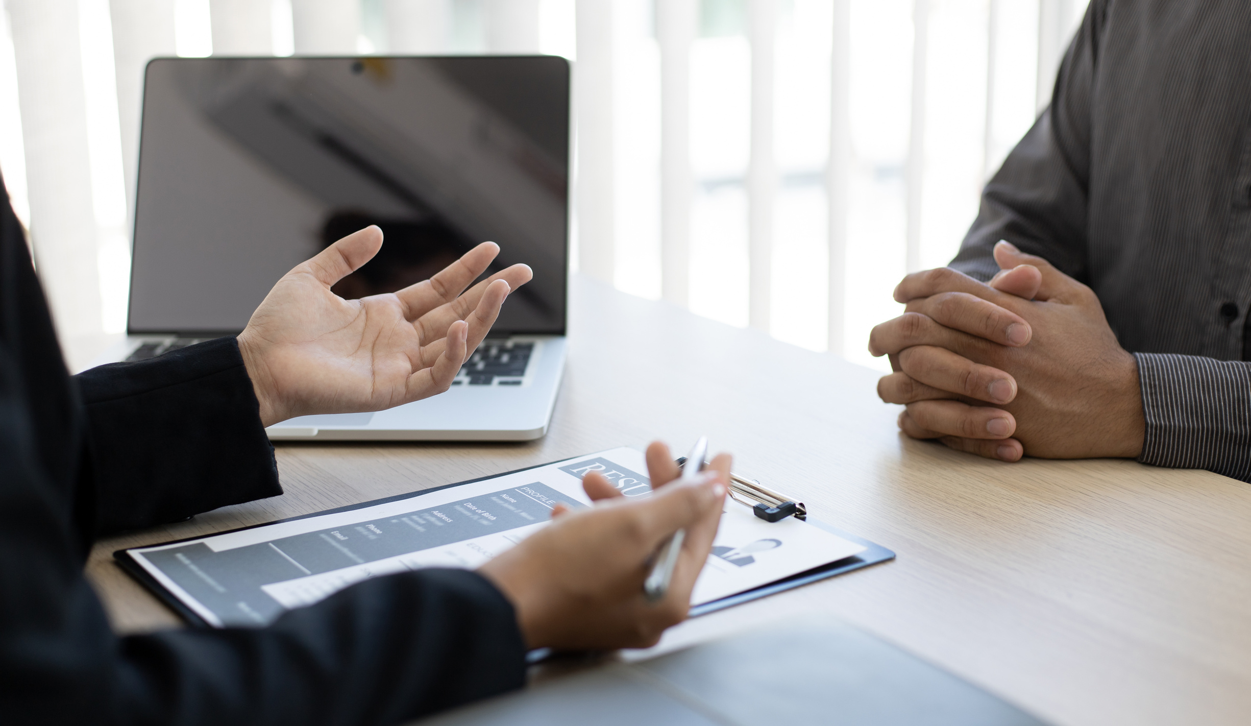 Employer Interviewing Job Applicant

